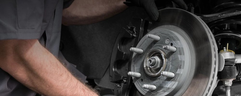 Chevrolet Certified Service and OEM Brake Rotor Parts being installed