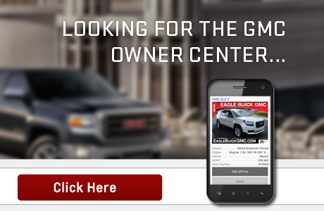 Looking for the GMC Owner Center...GMC vehicle in the background, photo of a cell phone searching for a vehicle on Eagle Buick GMC website. Click Here Button.