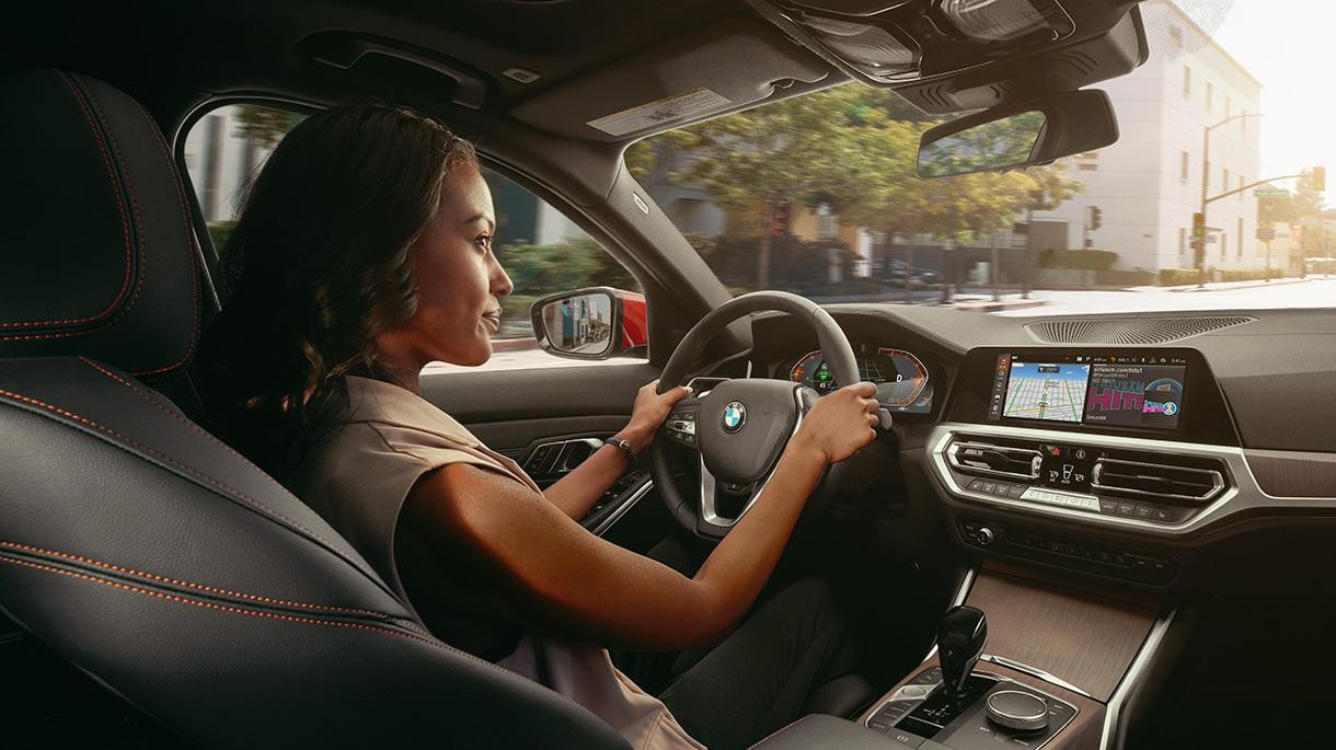 Woman driving a BMW.