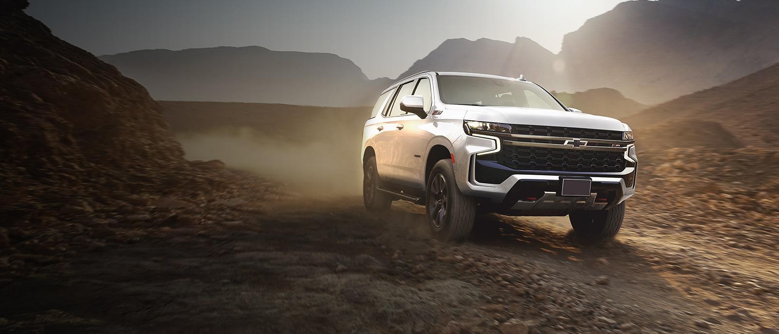 The 2024 Chevrolet Tahoe is sprinting in mountain area.