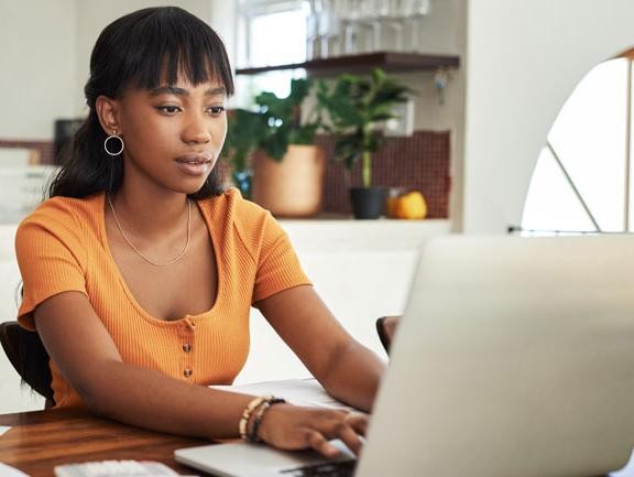 Woman looking at a laptop