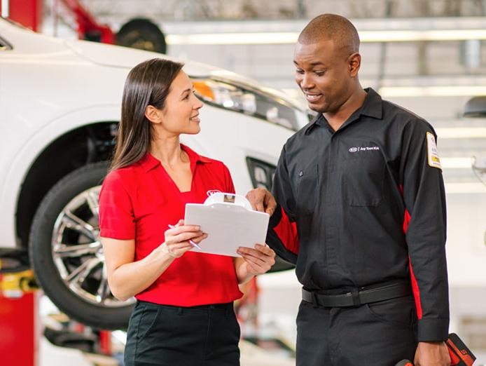 Service technician doing the complimentary inspection.