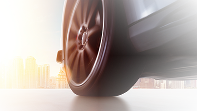 Front tire of a car on the road