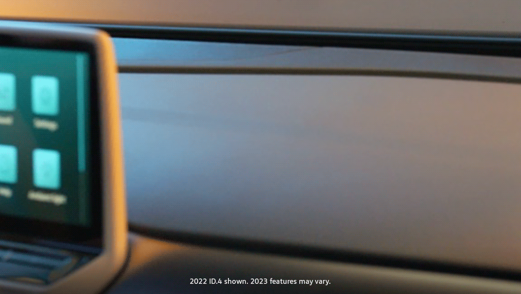 A light flickers across the dashboard of an ID.4