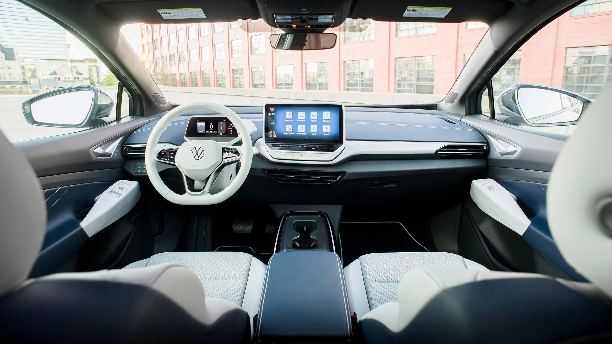 View of front cockpit area of an ID.4 shown in Cosmic interior as seen from the back seat.