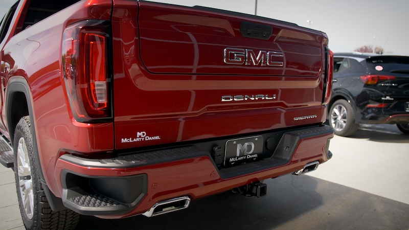 Red tailgate of GMC truck