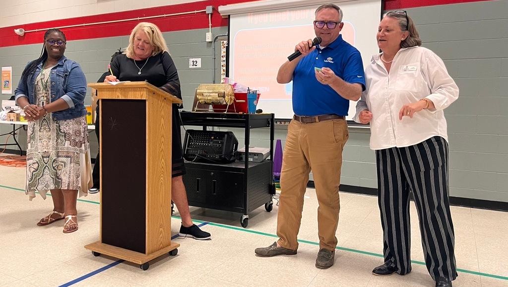 Vaden Automotive employee speaks in front of Savannah Arts Academy students