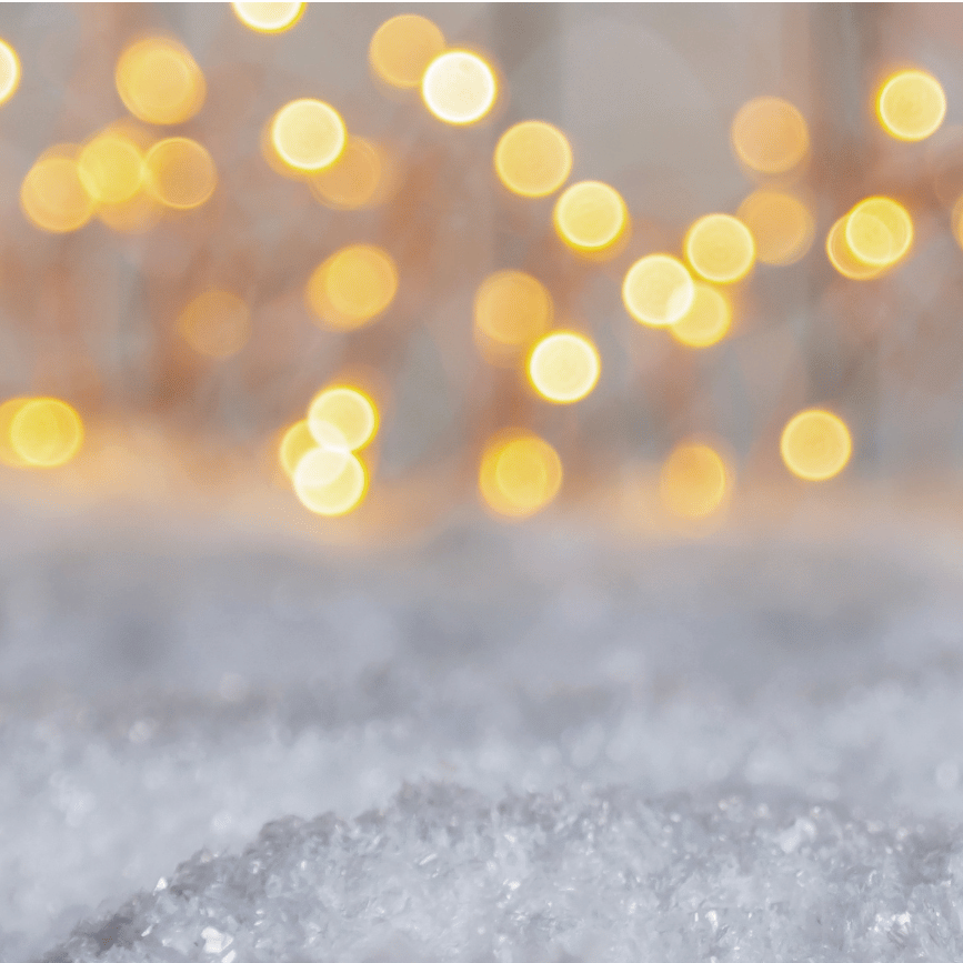 Snow with glowing white lights