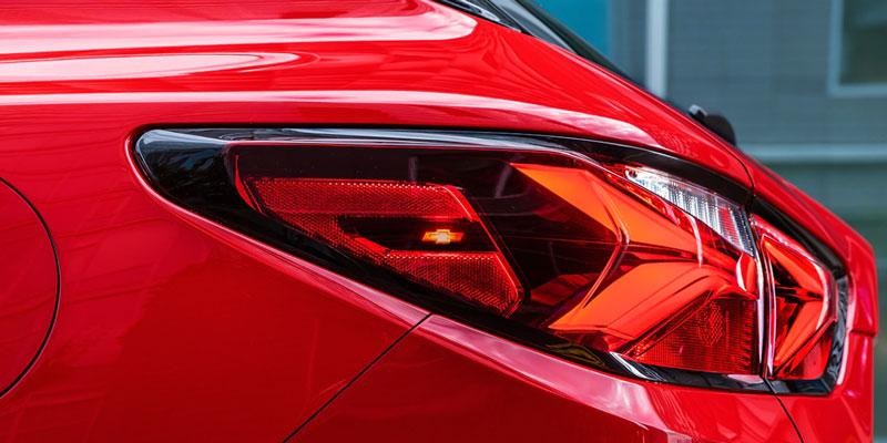 A close-up view of the taillight on a 2019 Chevrolet Blazer driving in Wichita, KS
