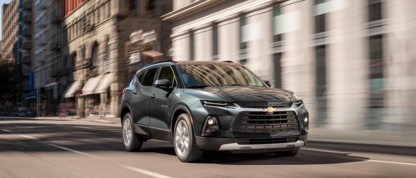 2019 Green Chevy Blazer Driving Down City Street Motion Blurr