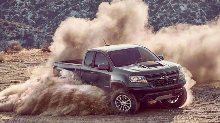 2019 Green Chevy Colorado Kicking Up Dust Off-Road