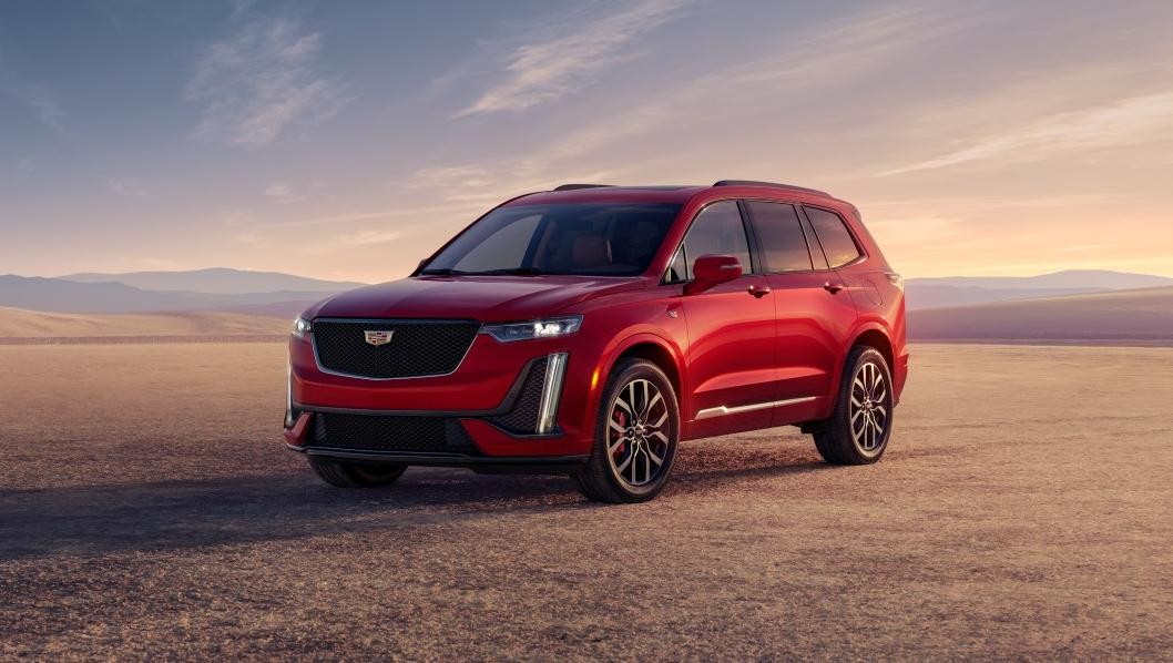 Red 2025 Cadillac XT6 with desert background