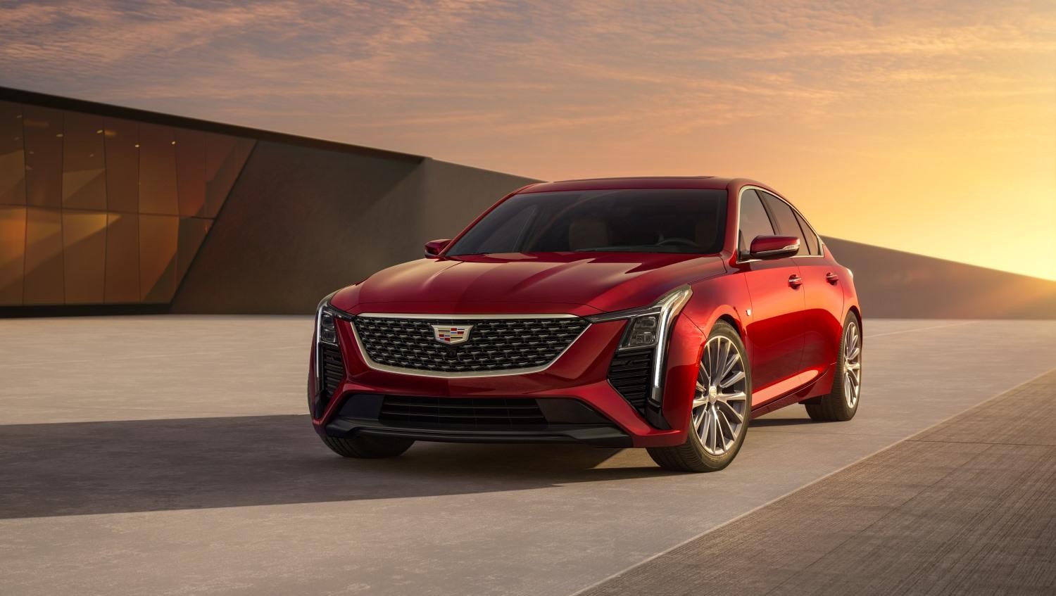Red 2025 Cadillac CT5 with sunset background