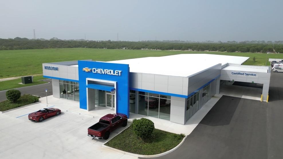 Exterior of Dealership with cars parked out front