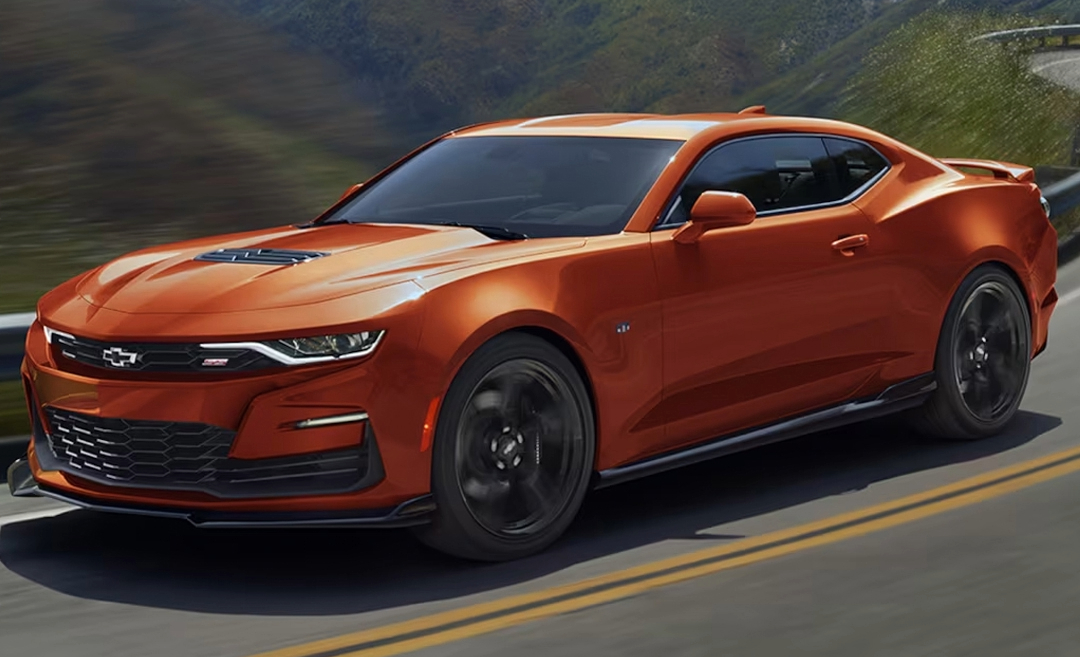 2024 Chevrolet Camaro cruising down a highway