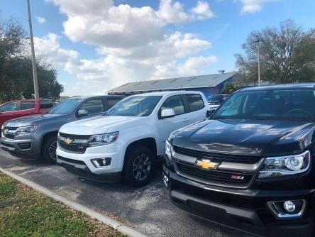 Huston Chevy lot with trucks