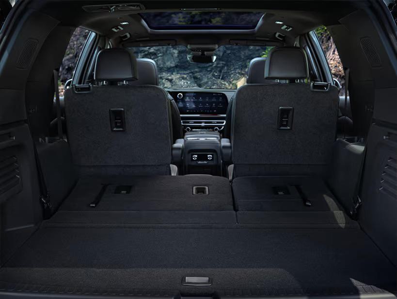 2025 Chevrolet Traverse trunk interior with back seats folded down