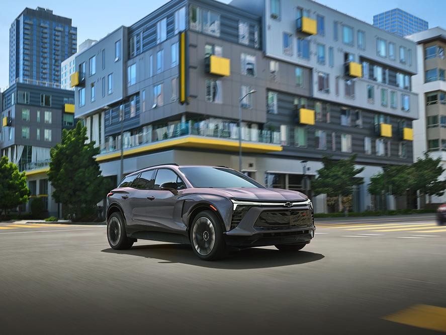 2025 Chevy Blazer EV driving through city streets