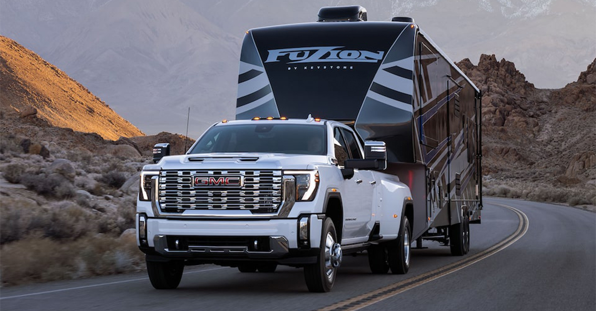 2025 GMC Sierra 2500 towing a camper