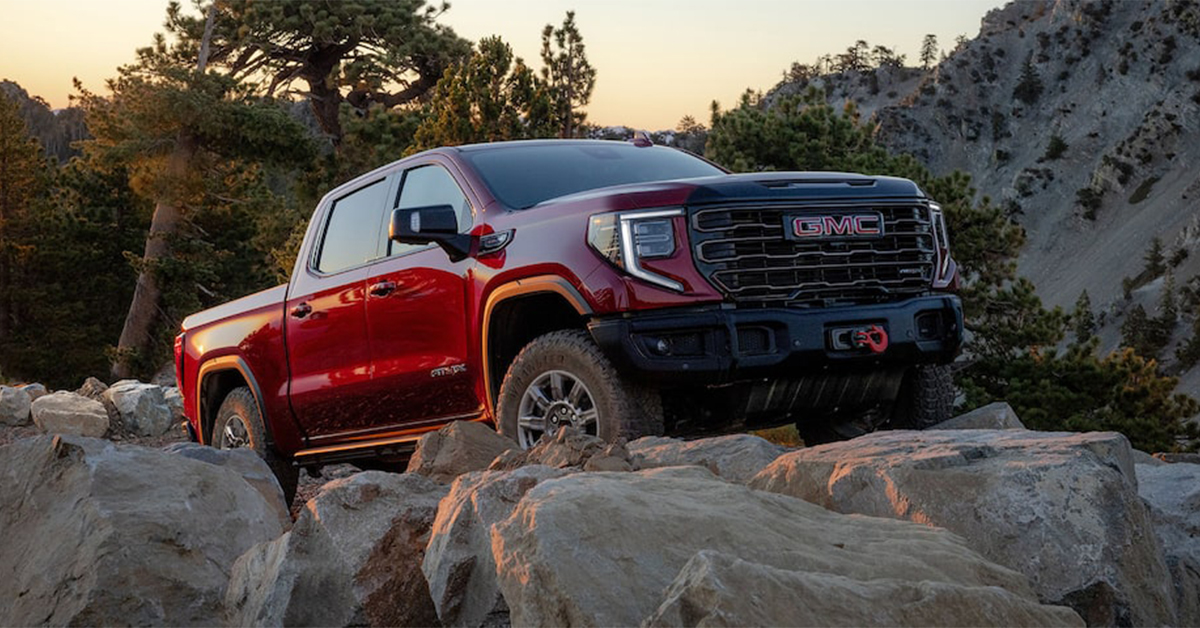 2025 GMC Sierra 1500 AT4 climbing over rocks