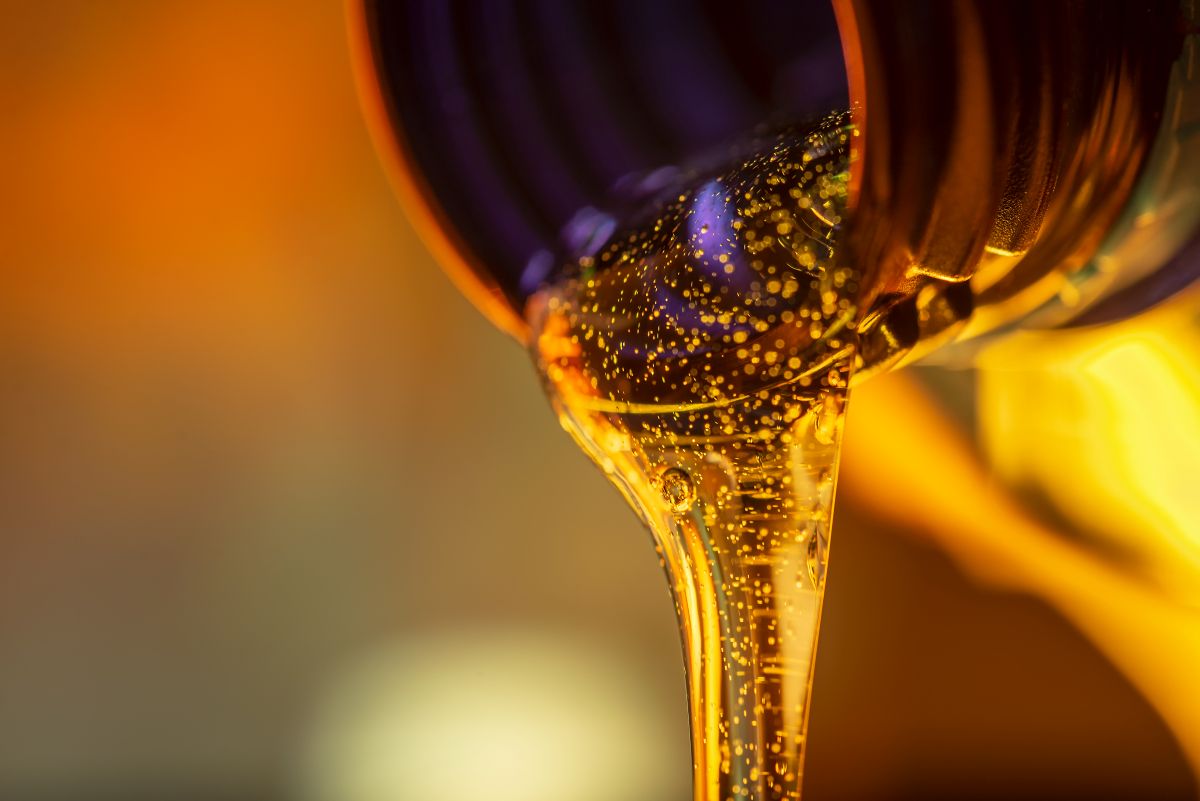 Pouring out synthetic oil