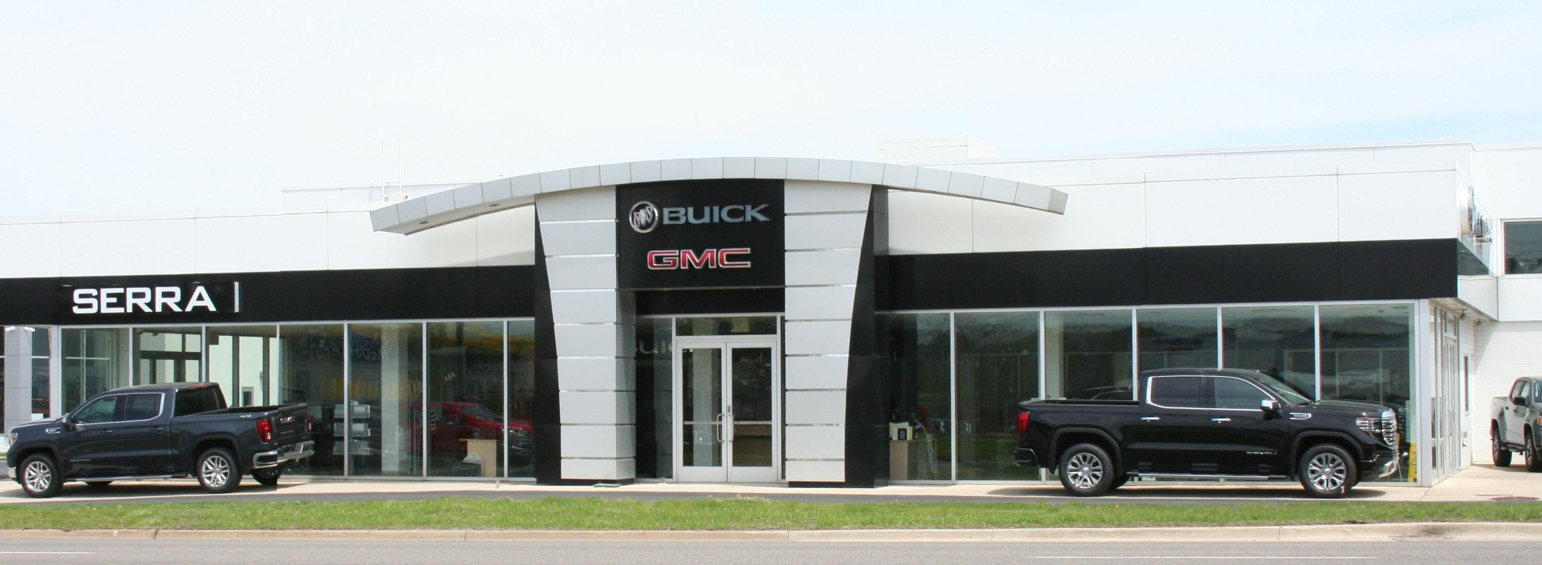 Smiling Women at dealership on phone