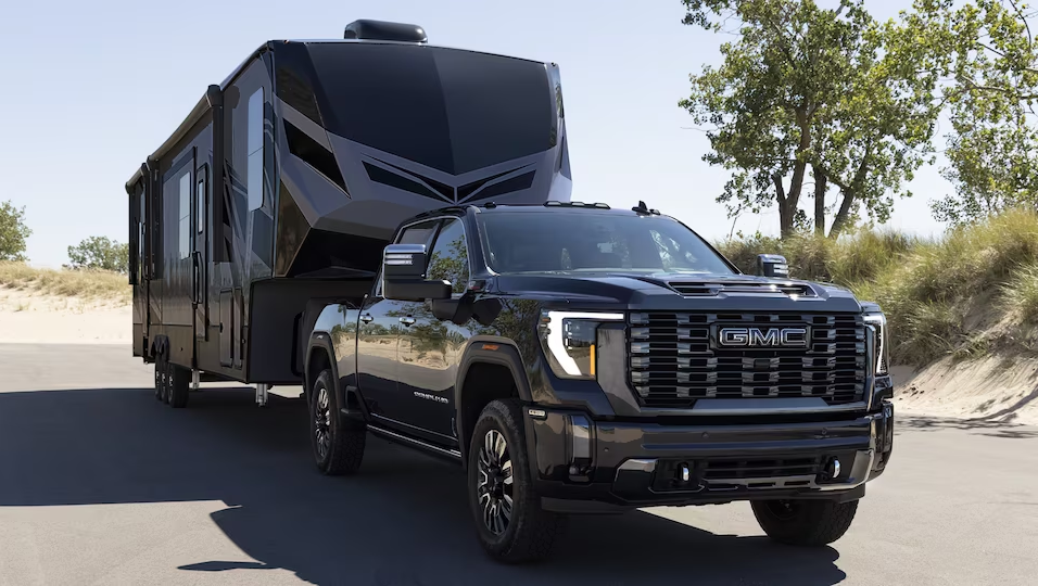 2024 GMC Sierra 2500 HD towing an RV trailer