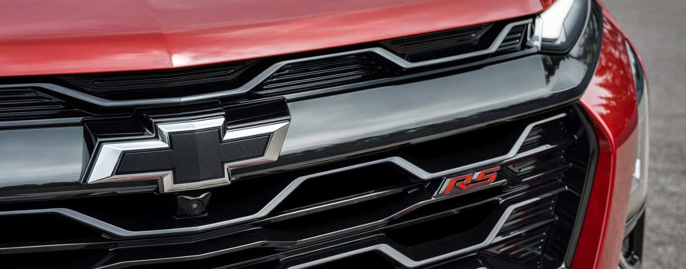 The grille on red 2025 Chevy Equinox for sale near Leesville.