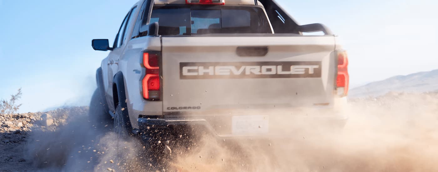 A tan 2025 Chevy Colorado ZR2 Bison is off-roading after leaving a Chevy dealer near Jonesville.
