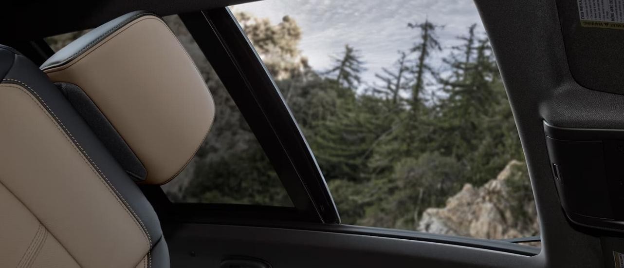 A close-up shows the open moonroof in a 2023 Chevy Equinox for sale in Alexandria.