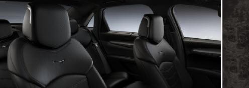 JET BLACK Leather Seating Surfaces with Chevron perforated inserts