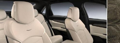 SAHARA BEIGE / JET BLACK ACCENTS Leather Seating Surfaces with Chevron perforated inserts