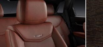 KONA BROWN SAUVAGE Jet Black accents and Leather Seats with Mini- Perforated Inserts