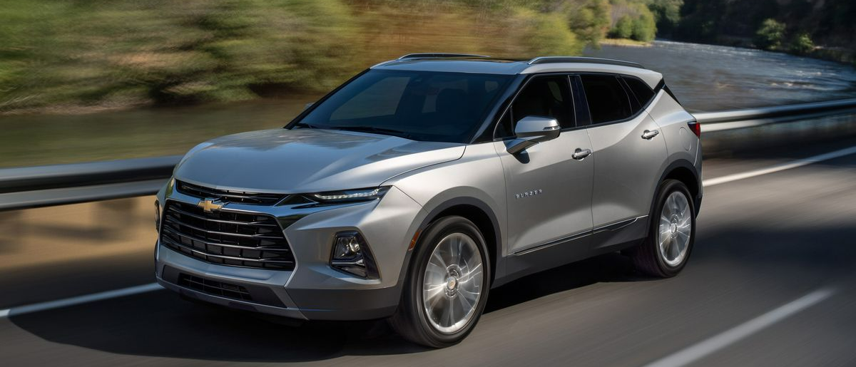 Gray Chevrolet Blazer Driving