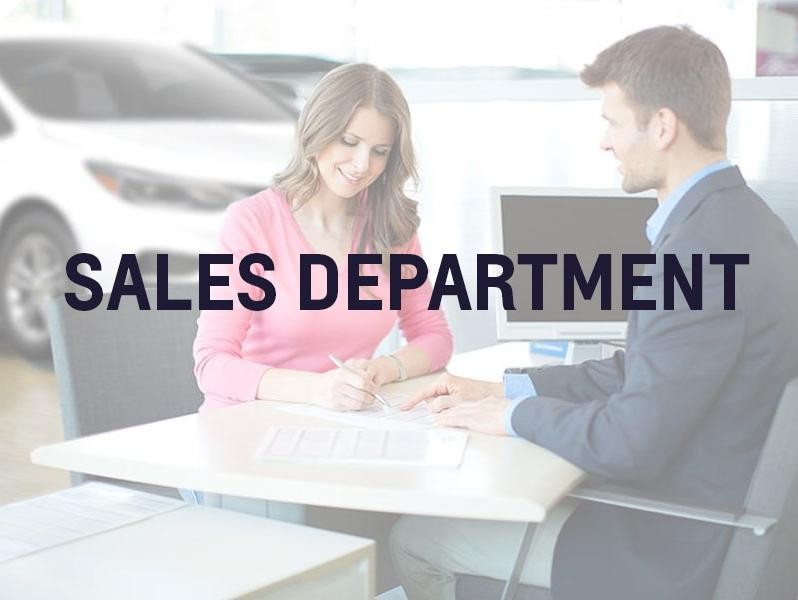 Happy children running in a dealership showroom with sale icon