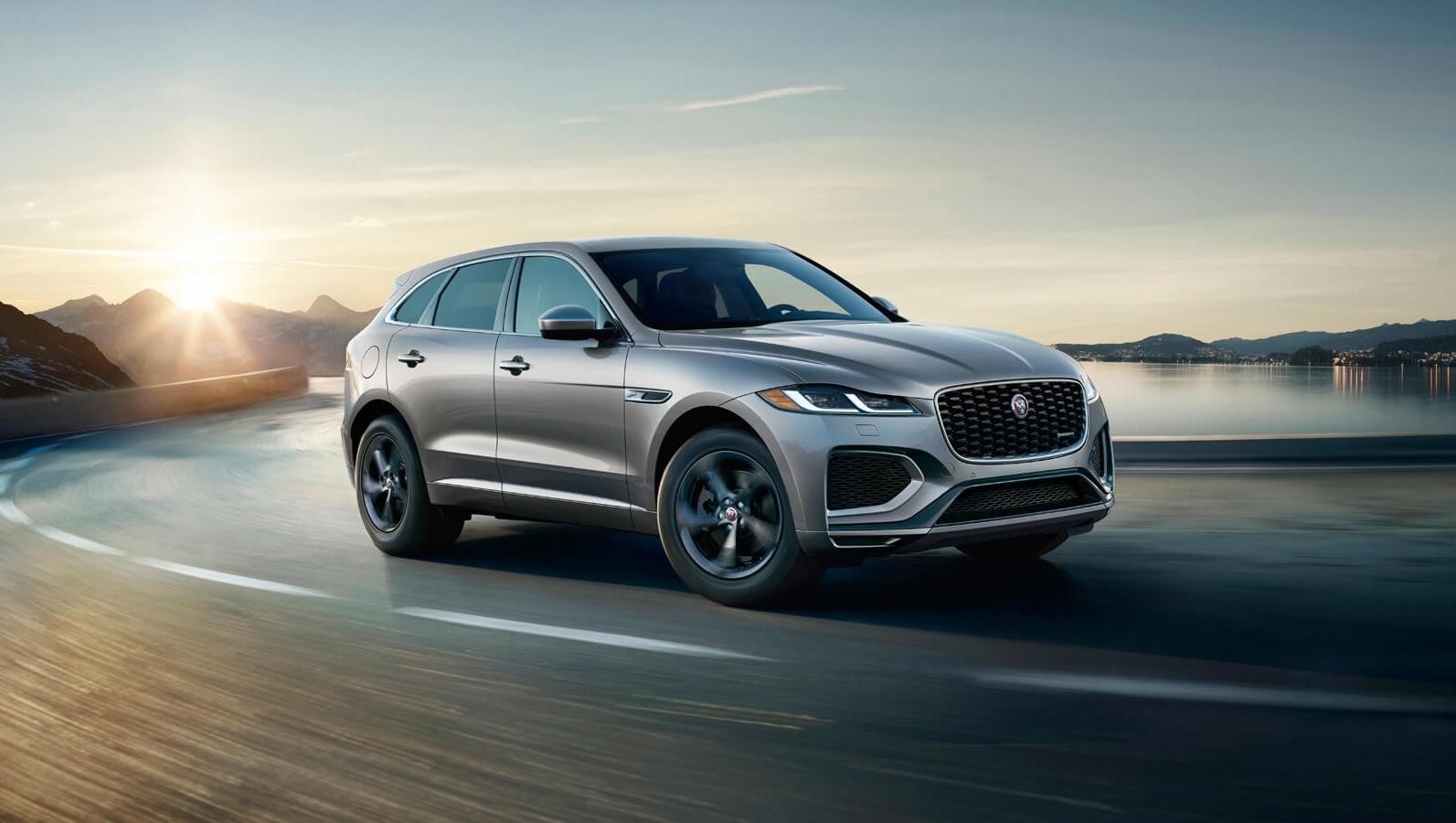 Jaguar SUV cruising on road