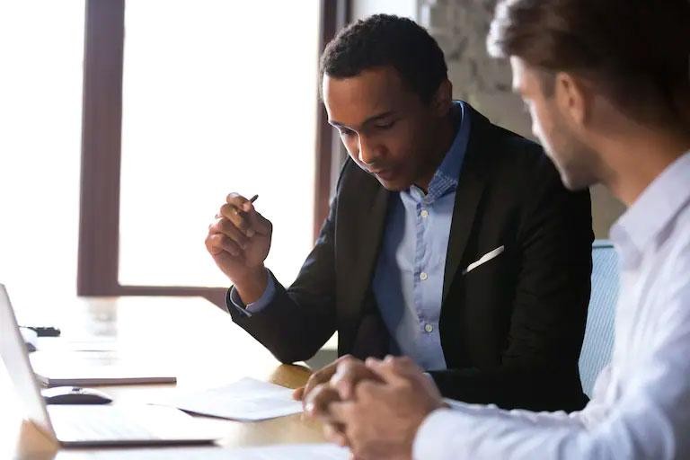 Customer signing on finance papers