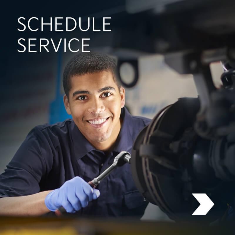 Service person working on brakes
