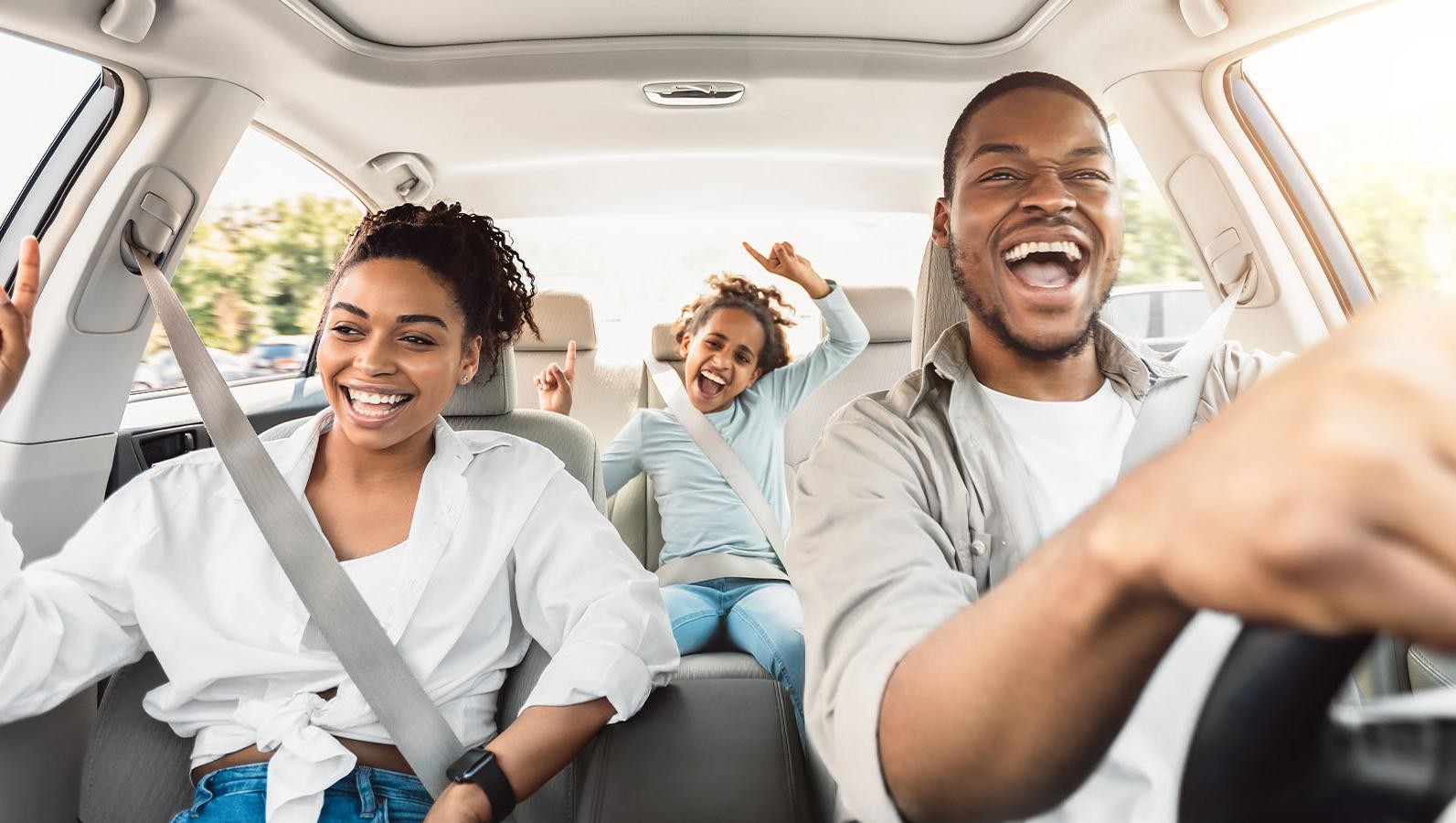 Happy Family in a car