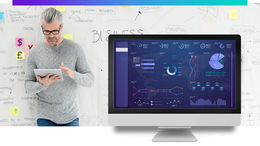 man in front of a white board that says business plan