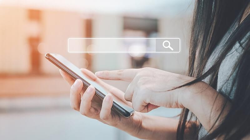 Woman searching on a smart phone