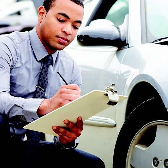 Technician filling out clipboard