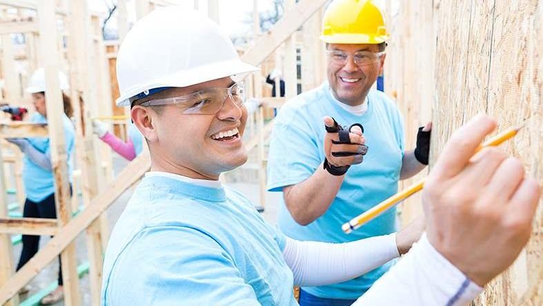 Volunteer Construction Workers Framing House