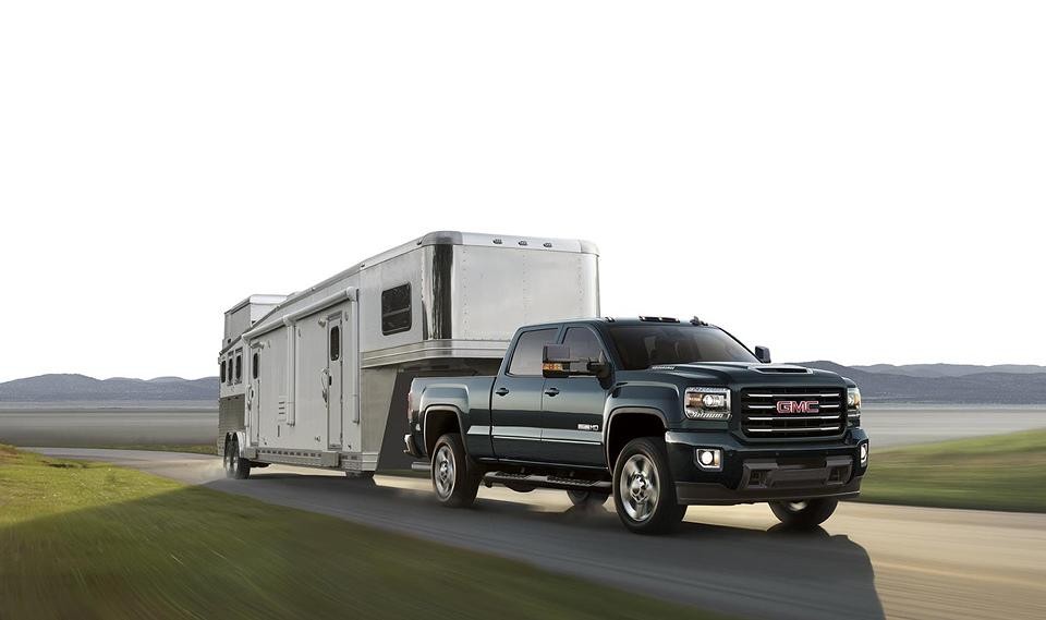 2018 GMC Sierra 2500HD towing a large trailer