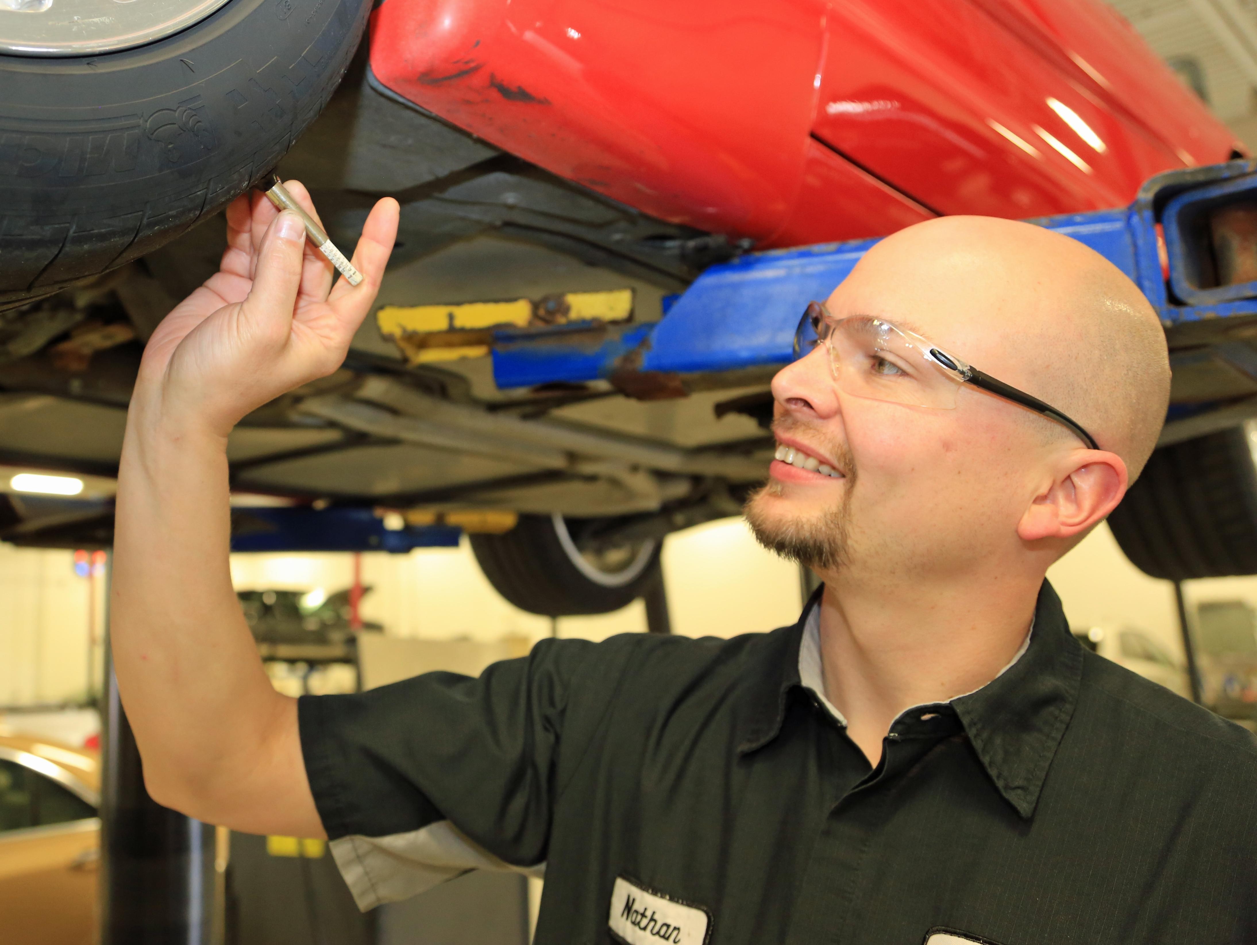 Tire changing in service bay