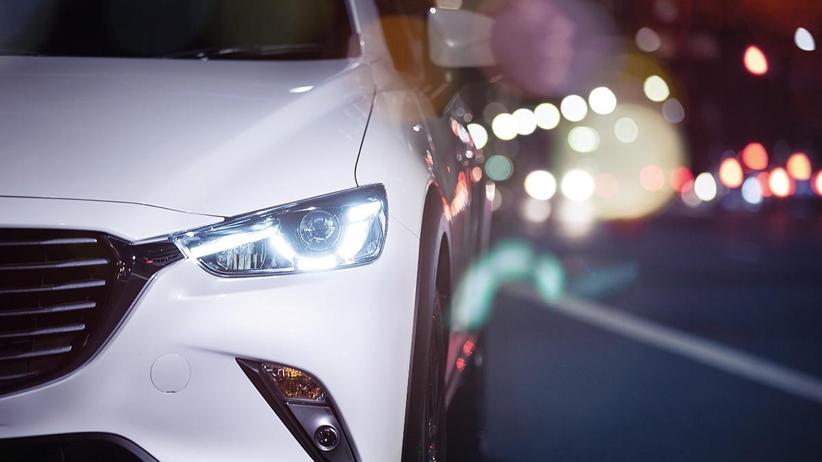 2017 CX-3 Front view of headlight and grill.