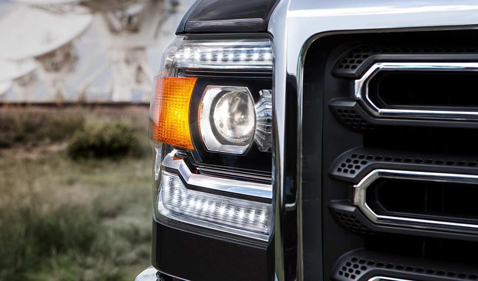 A close up view of the grill of a 2018 GMC Sierra 2500HD