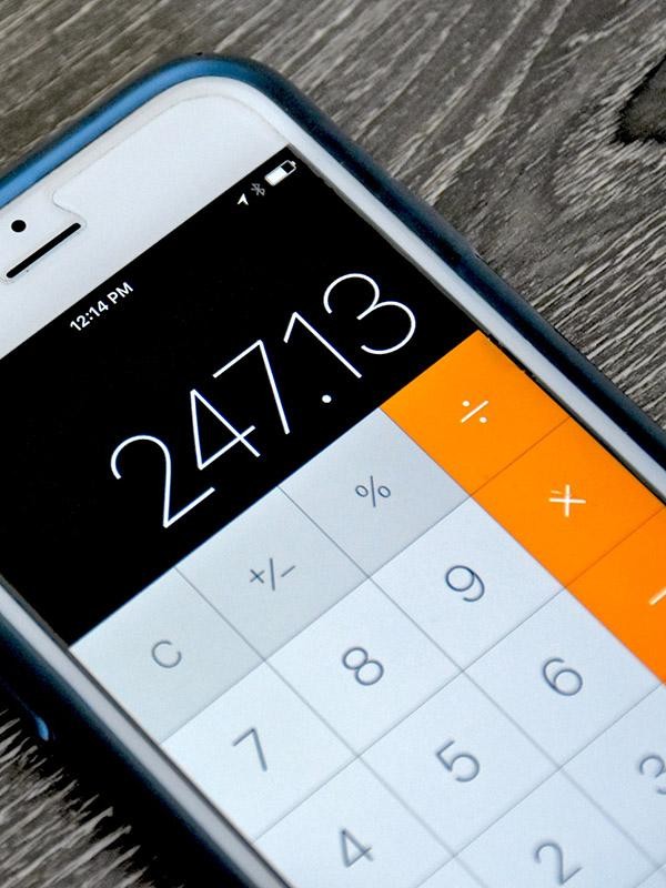 Close-up of a phone with the calculator app showing.