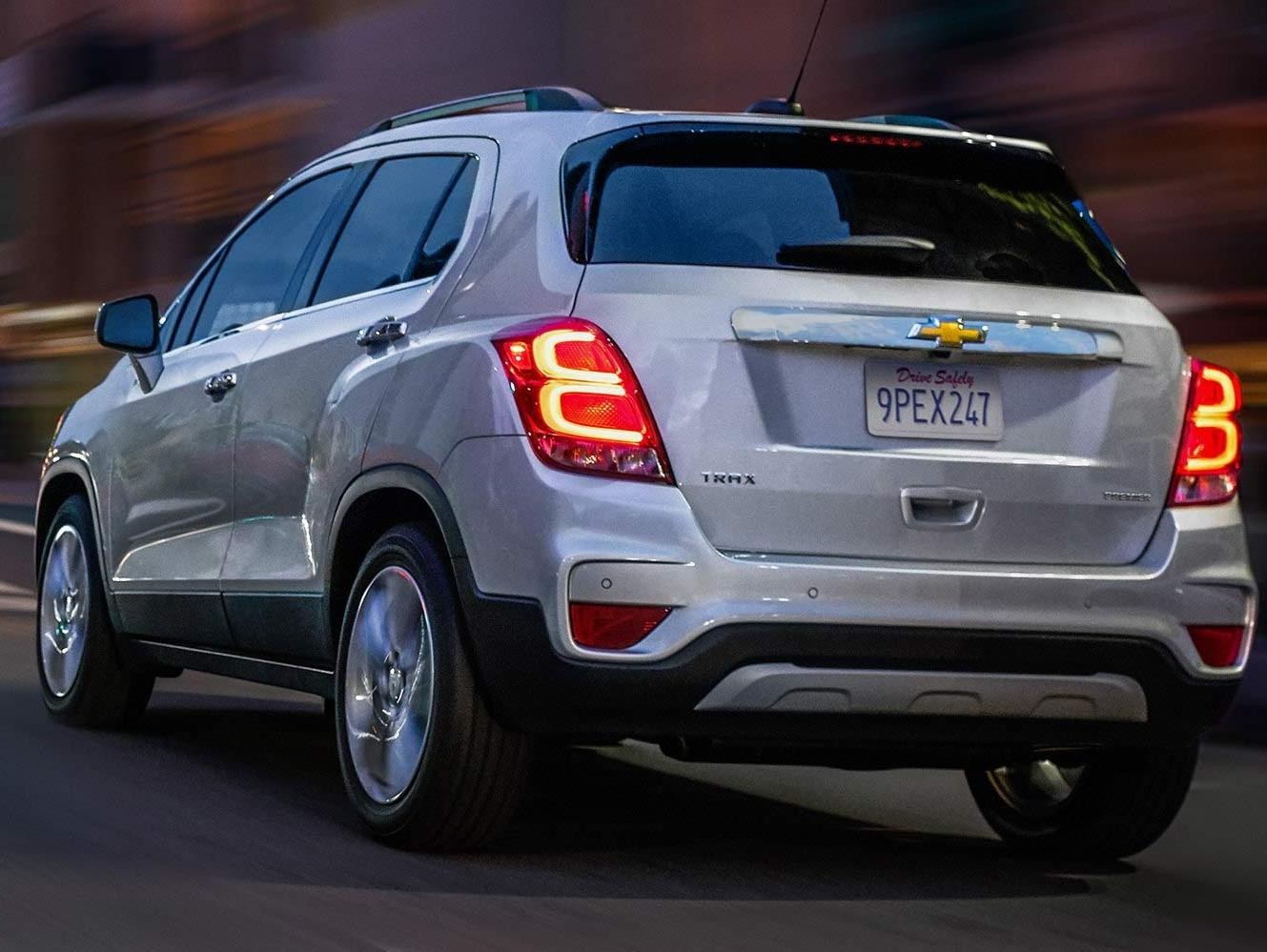 White 2019 Chevy Trax driving on a road