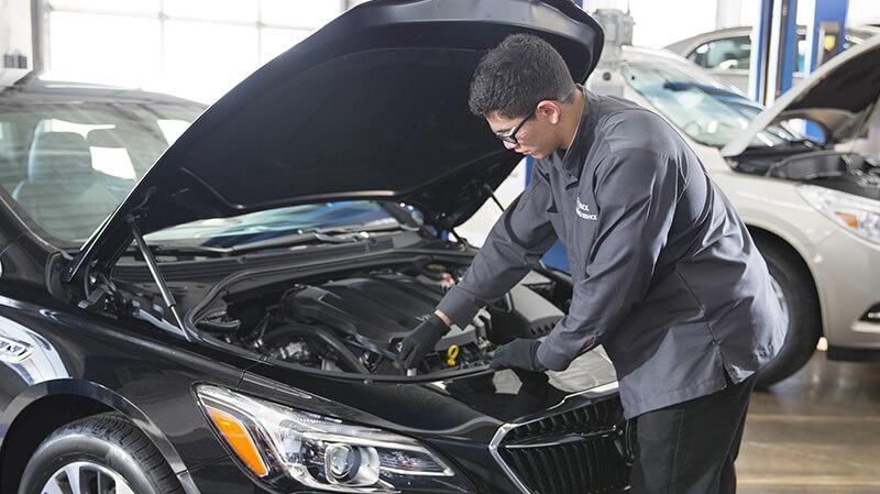 Certified-Service Mechanics in Service Bay
